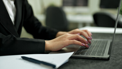 Cropped shot Person typing on laptop keyboard, businesswoman working on laptop