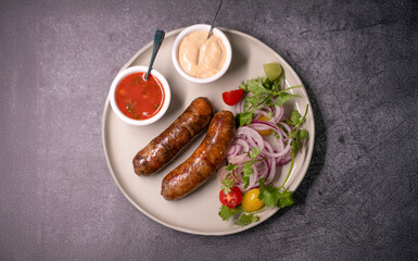 Fried Sausages with Ketchup, Herbs and Onions