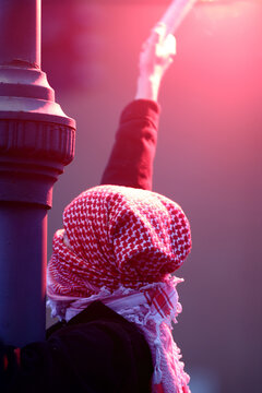 Protester Wearing Keffiyeh Holds Red Flare During Demonstration in Rome - October 2025