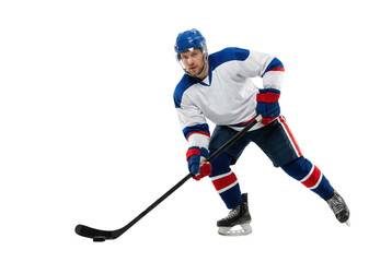 Obraz premium Ice hockey player skating with stick isolated on white background