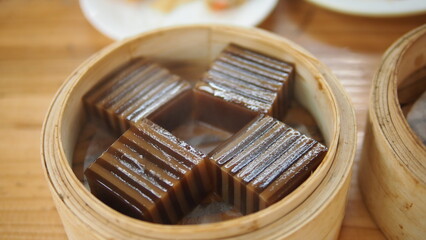 Chinese style restaurant dim sum, dessert, Black Sugar Coconut Cake in Hong Kong 