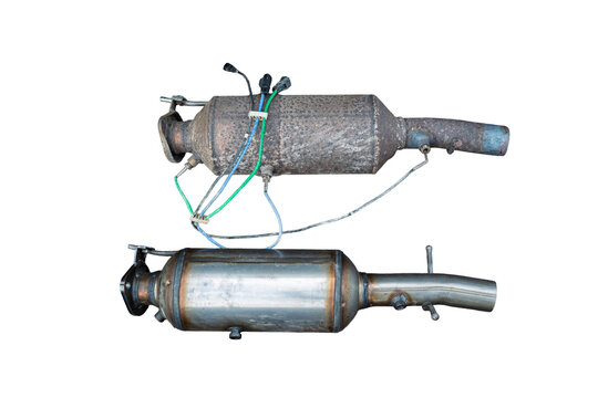 Two used, diesel particulate filters isolated on white, no people