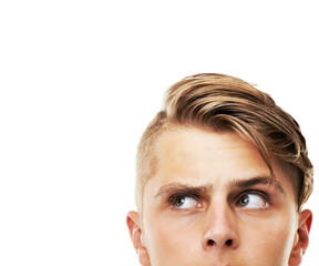 Young man, head and thinking or looking up on mockup isolated against a white studio background. Cropped face of handsome male person, hipster or model in wonder or thought for ideas or solution
