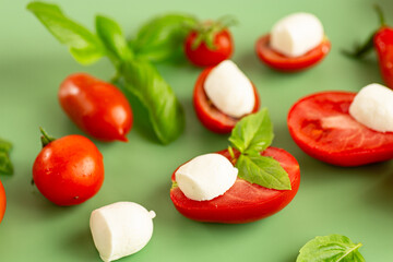 cherry tomatoes mozzarella and basil in composition