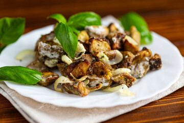 Homemade roasted eggplant salad with onion and herb dressing