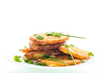 Delicious fried potato pancakes on a white background