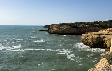 Obraz premium The beautiful view of cliffs during the sunset Albandeira, Algarve, Portugal