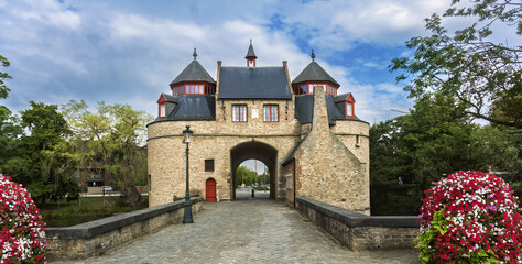 Ezelpoort (Donkey's Gate), a medieval city gate located in Bruges, Belgium. It is one of four remaining original gates from the city's second ring of fortifications 
