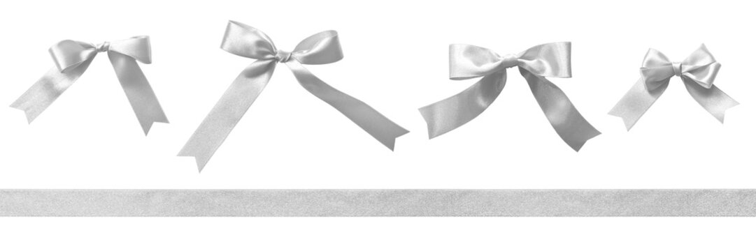 Silver bow satin ribbon stripe set isolated on white background with clipping path for Christmas and wedding card gift box design decoration element