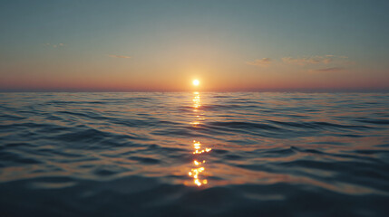 Fototapeta premium A mesmerizing view of the sunset over the serene ocean, painting the sky with warm hues