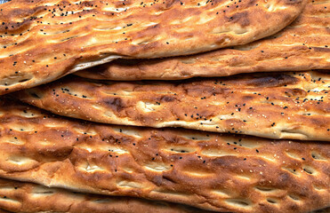 Authentic eastern bread with crunchy sesame and golden crust.