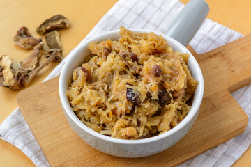Christmas lenten sauerkraut with wild mushrooms and smoked plums