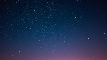 Fototapeta premium Glowing starry sky filling rural horizon, showing stars, bright star, blue-indigo pink glow