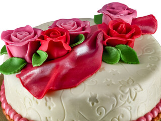 Celebration Cake with Pink Roses and Red Fondant Drape on Embossed White Base Happy Holiday Background 