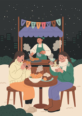 Enjoying Street Food at a Winter Market Festival