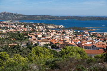 Fototapeta premium La Maddalena, Sardinia. View of a Coastal Town Near the Sea on a Clear Day