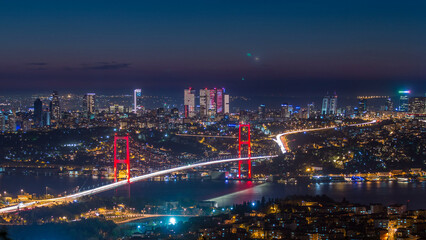 Obraz premium Istanbul city skyline cityscape time lapse from day to night view of bosphorus bridge and financial business center