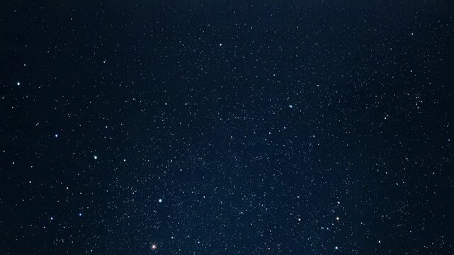 Drifting camera filming night sky star field shifting down and right, with bright lower-left stars