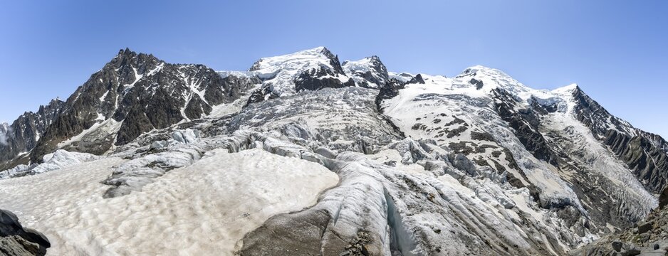High alpine glaciated mountain landscape, La Jonction, Glacier des Bossons meets Glacier de Taconnaz, summit of Aiguille du Midi, Mont Maudit and Mont Blanc, Chamonix, Haute-Savoie, France