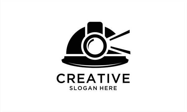 Creative hard hat with camera lens and light beam logo design.