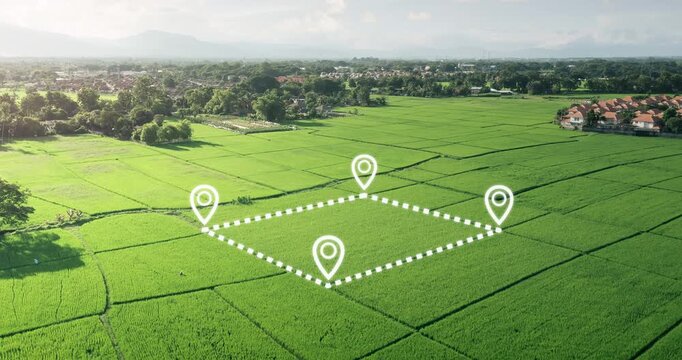 Aerial view of vacant land plot marked with location pin in green field in Chiang Mai, Thailand. Represents land for sale, property location mapping, real estate investment and land development.