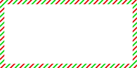 Fototapeta premium Striped candy cane red green diagonal frame with blank space. Christmas Candy cane rectangle frame. New Year border frame