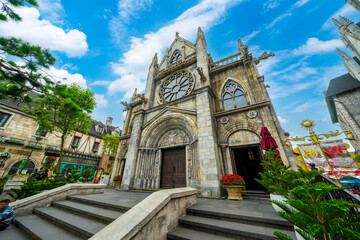 Catholic church on the square in the French village in Ba Na Hills Park, Danang, Vietnam.