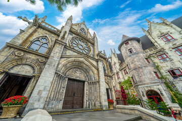 Catholic church on the square in the French village in Ba Na Hills Park, Danang, Vietnam.