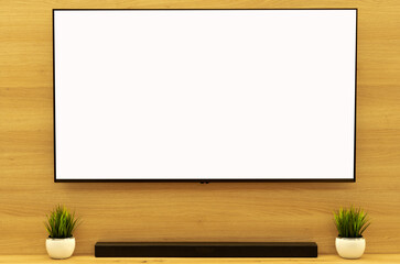 Modern smart TV blank screen mockup on wood paneled wall with soundbar in minimalist living room interior, perfect for technology or design display