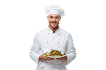 Portrait of professional male chef in white uniform holding plate with colorful salad isolated on transparent background, png