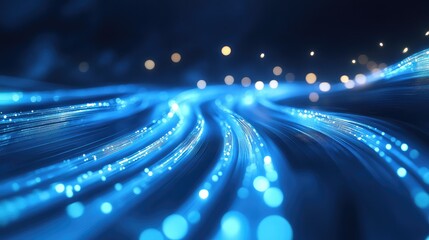 Blue illuminated fiber optic lines visualize high speed digital data streaming and global network communication, representing advanced technology, fast internet, and modern connectivity concepts