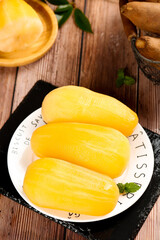 Fresh Yellow Mangoes on Plate with Mint - Healthy Tropical Fruit