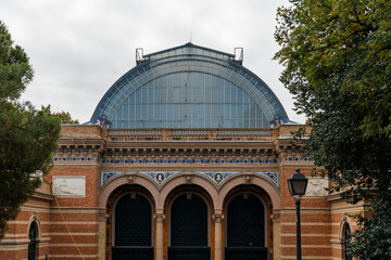 Palacio de Velazquez exhibition hall architecture in Retiro Park, Madrid