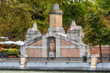 Retiro Park Sphinx fountain monument in Madrid during autumn
