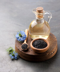 Black cumin oil and nigella flower