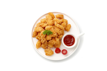 Crispy Golden Chicken Nuggets with Ketchup Sauce on White Plate