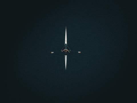 Aerial view of a rower gliding across the dark, glassy Charles River, a sleek white scull creating a striking contrast against the water's deep tones, Boston, Massachusetts, United States.