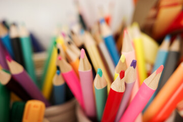 Colorful Wooden Pencils in Classroom Environment with Shallow Depth of Field