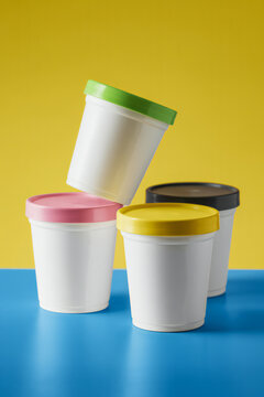Modern icecream cups onc olorful background