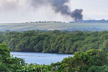 Mangrove Forest and Sugarcane Field Burning Near River, Jo&atilde;o Pessoa, Para&iacute;ba, Brazil