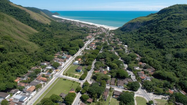 Vibrant beach view of Maresias, Brazil, showcasing skyscrapers, colorful umbrellas, and vacationers enjoying a sunny day
