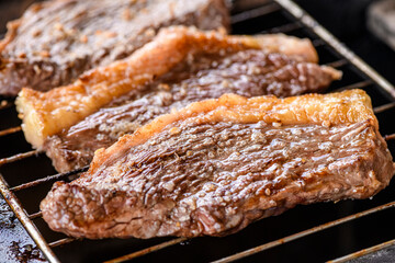 Grilled Picanha Steaks on a Barbecue Grill Braziliam Churrasco
