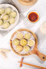 Steamed Chinese Scallion Buns with Dipping Sauce and Chopsticks