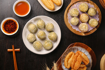 Asian Dim Sum and Fried Snacks Flatlay with Dipping Sauces