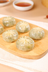 Steamed Asian Pork Dumplings with Dipping Sauce