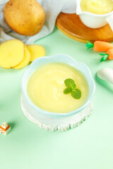 Homemade Mashed Potatoes with Fresh Mint Garnish