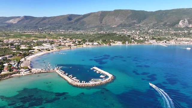 Aerial drone cinematic video of famous seaside village of Alykes featuring popular resort beach of Alykanas in northern part of Zakynthos island, Ionian, Greece