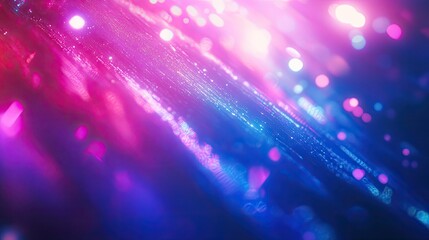 Abstract background showing bright pink and blue bokeh lights with diagonal lines and glowing particles suggesting digital data transfer, modern technology, and global network connections