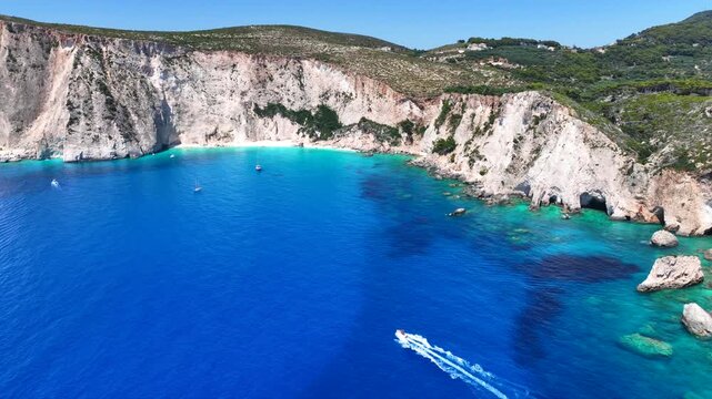 Aerial drone cinematic video of scenic cave of Eros visited by boats and yachts in northern part of Myzithres islets a true paradise in island of Zakynthos, Ionian, Greece