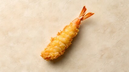 Fototapeta premium Golden Fried Shrimp Appetizer on a Textured Beige Surface